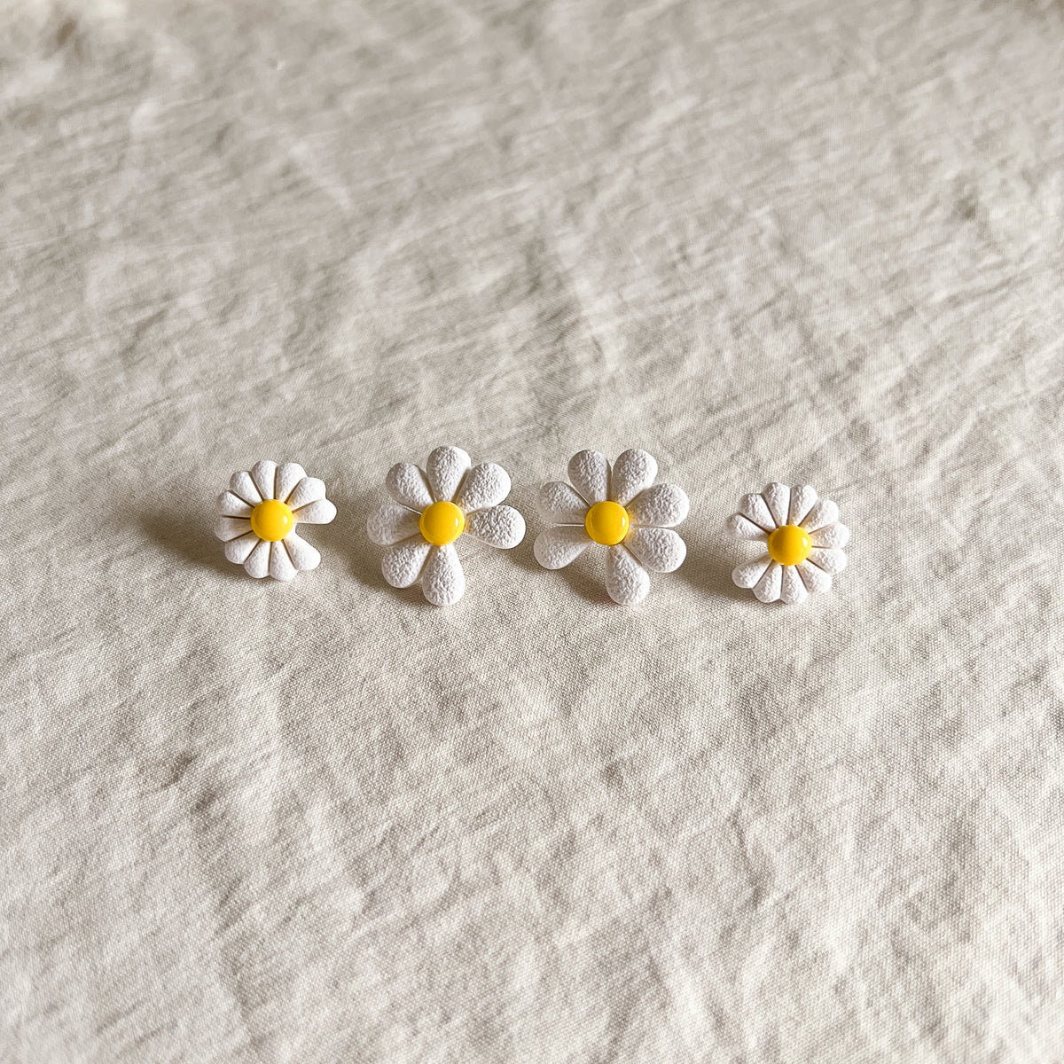 PEACEMINUSONE Daisy Studs